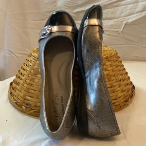Metallic silver flats with black patent toe